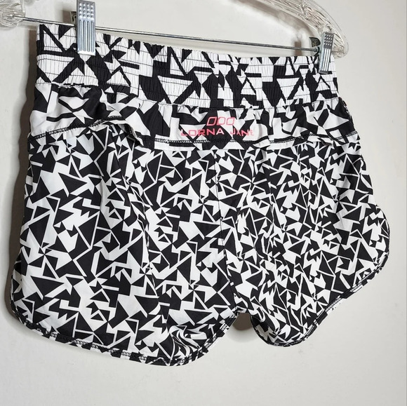 Lorna Jane running shorts. Pink side zippers. Built in shorts. Size XS. - Picture 5 of 11